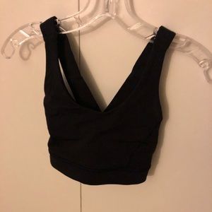Black lululemon sports bra with criss cross back